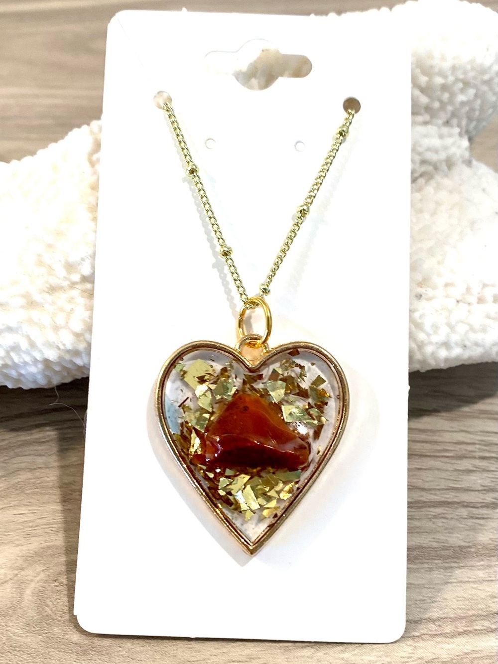66. Gold Heart Pendant Necklace with a Carnelian stone and beach sand